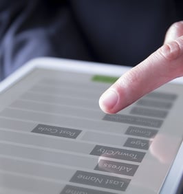 Image of someone typing on phone screen