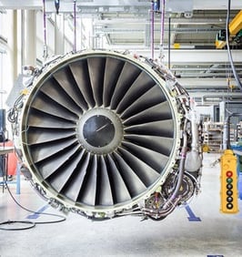 Image showing a jet engine with a control pendant being repaired.