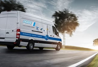 Image of Pfaff silberblau service car driving down the road