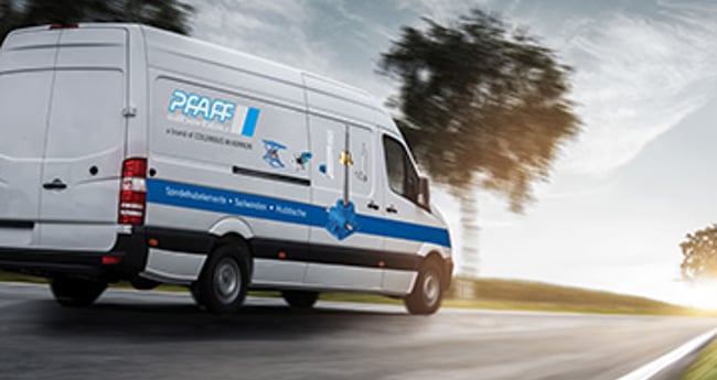 Image of Pfaff silberblau service car driving down the road