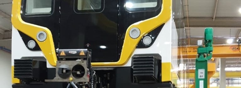 Image of Train Being Lifted By Crane System