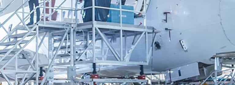 Image of Man working on an Airplane 