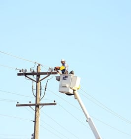 Electric Line Worker on Pole